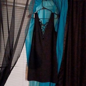 Worn once lrg Forever 21 deep cut lace up mini dress